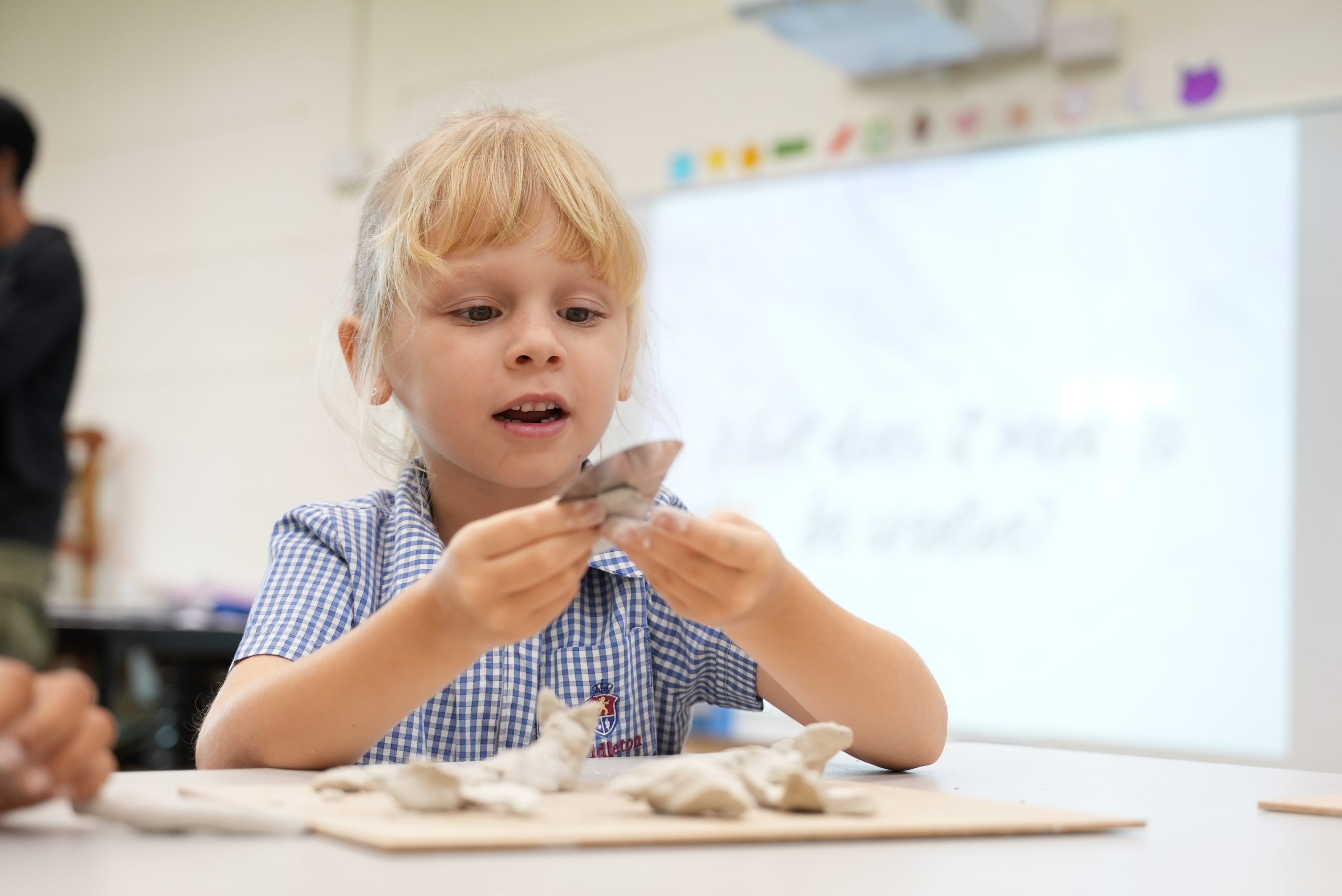 Early Years child engaged in inquiry-based, Reggio-inspired learning at Middleton